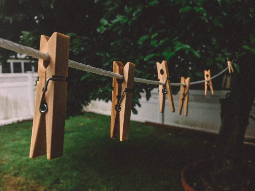 clothes pins on line indicating the oneness of holistic life coaching