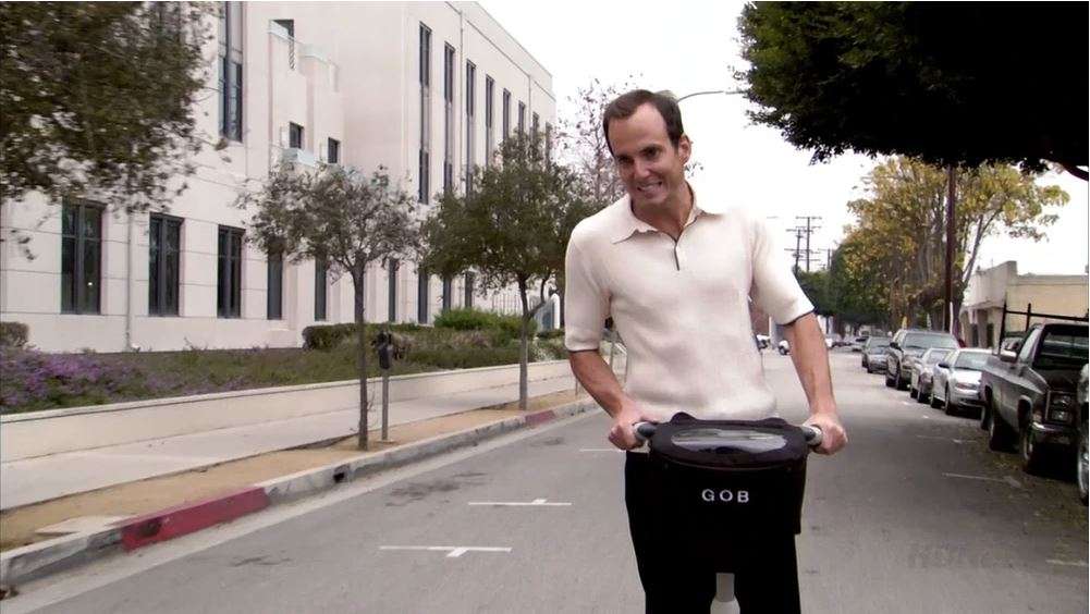 GOB Bluth on a Segway deceptively acting as a life coach
